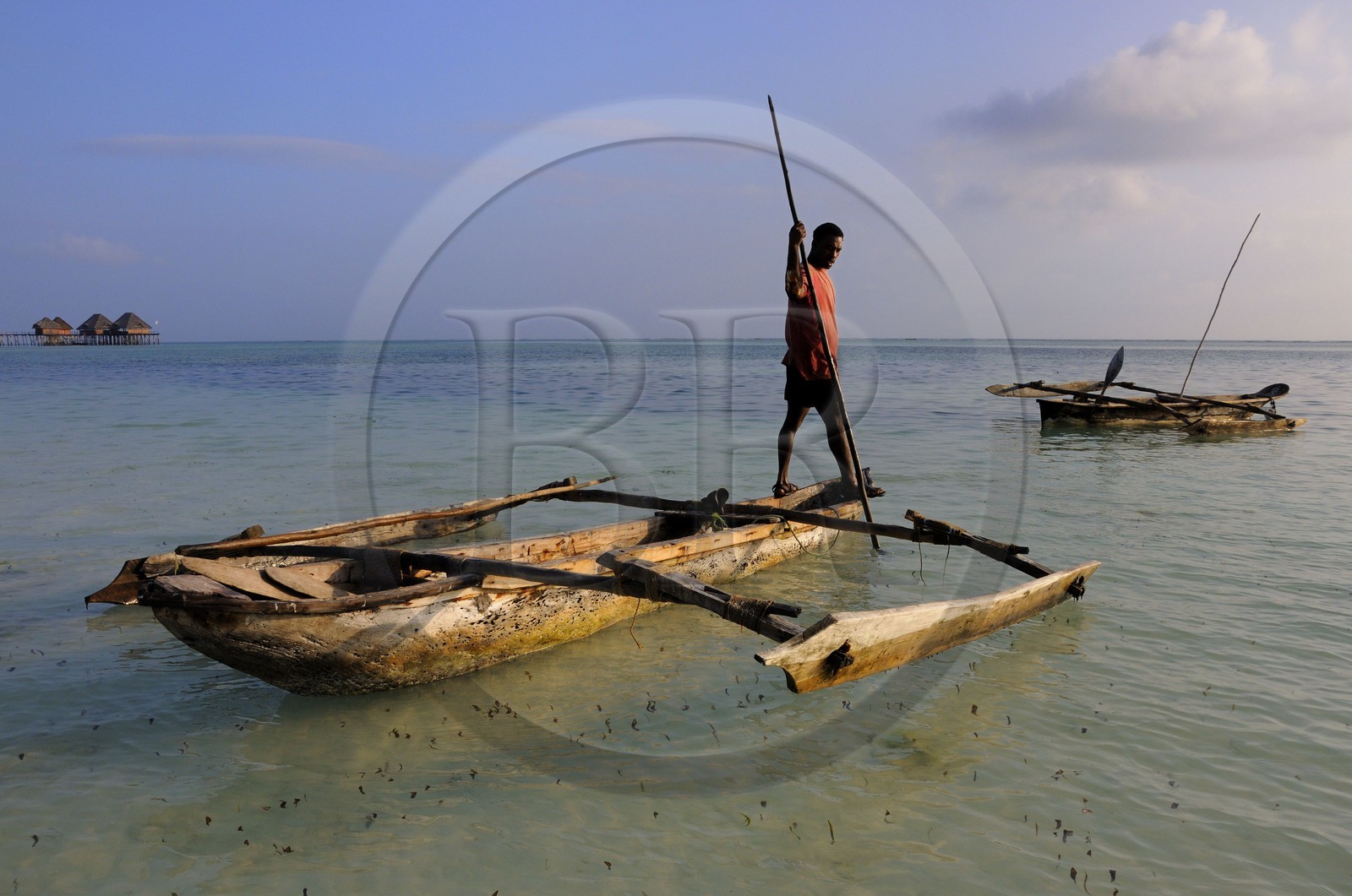 Tanzania, Zanzibar Archipelago, Unguja island (Zanzibar), southeast coast, Bwejuu, fisherman on a dhow (traditional Arab sailing vessel)