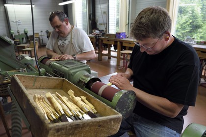 France, Dordogne, Périgord Vert, Nontron, manufacturing knives in the Coutellerie Nontronaise Factory, roughing the handle