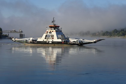 France, Seine-Maritime, Pays de Caux, Norman Seine River Meanders Regional Nature Park, Duclair, the ferry crossing the Seine in the morning mist