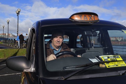 United Kingdom, Northern Ireland, Belfast, Billy Scott in his Black Cab