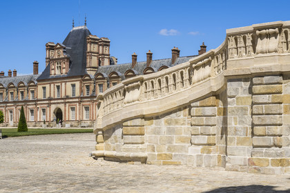 France, Seine-et-Marne, Fontainebleau, castle of Fontainebleau listed as World Heritage by UNESCO, Cour du Cheval blanc, horseshoe staircase made in 1550 by Philibert Delorme then redone between 1632 and 1634 by Jean Androuet du Cerceau, it is composed of two monumental parallel fretted flights of 46 steps