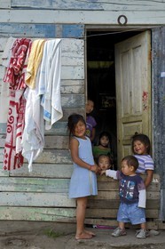 Panama, Chiriqui province, small town of Volcan, native American Nägbe family outside their house