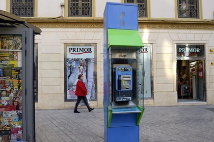 Spain, Andalusia, Malaga, telephone booth plaza de Felix Saenz