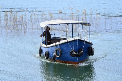 Croatia, Dalmatia, Krka National Park where Krka River becomes Lake Visovac, Brother Stojan from the Visovac Franciscan Monastery