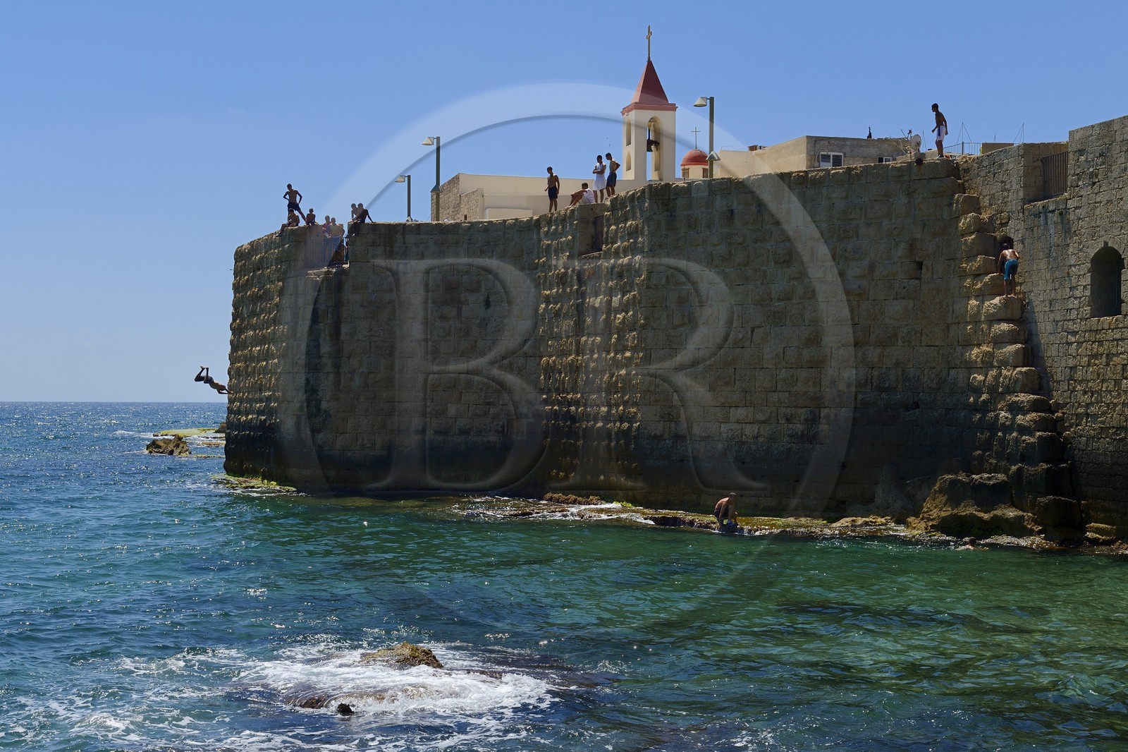 Israel, North district, Galilee, Acre (Akko), old town, listed as World Heritage by UNESCO, the port of Pisa and St. John's Church overlooking the sea wall
