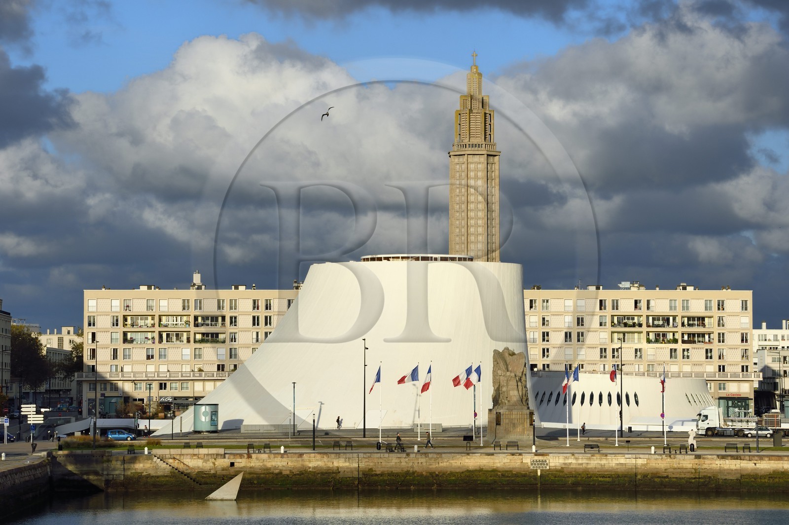 France, Seine Maritime, Le Havre, Downtown rebuilt by Auguste Perret listed as World Heritage by UNESCO, Perret buildings around the Bassin du Commerce, the Volcan created by Oscar Niemeyer and the Lantern tower of Saint Joseph church
