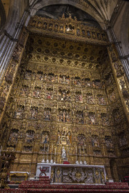 Spain, Andalusia, Seville, the cathedral, listed as World Heritage by UNESCO, the altarpiece with 45 scenes from the life of Christ engraved in gold-covered wood created by the craftsman Pierre Dancart (1480), Altar Mayor is the largest altarpiece in the world