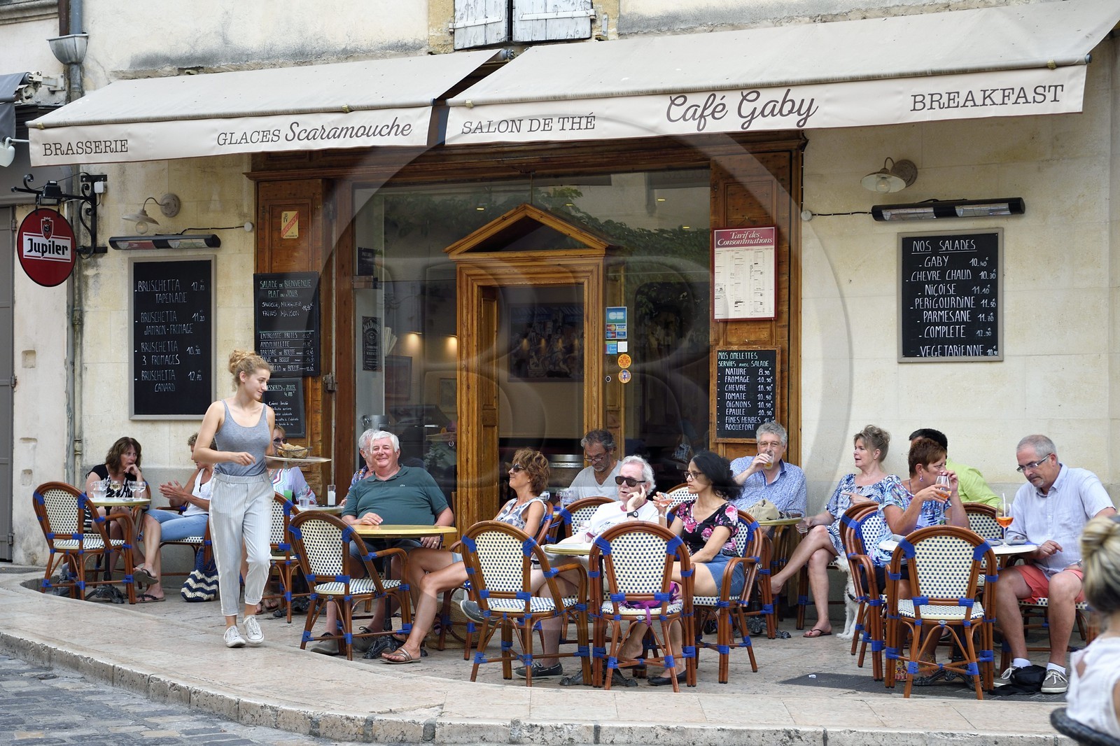 France, Vaucluse, Parc Naturel Regional du Luberon (Natural Regional Park of Luberon), Lourmarin, labelled Les Plus Beaux Villages de France (The Most Beautiful Villages of France), Café terrace in the Main Street
