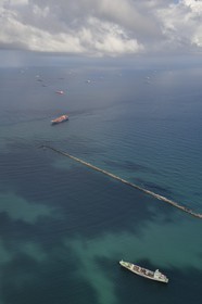 Panama, Colon province, the Limon Bay (Bahia Limon) in the Caribbean Sea at the output of the Panama Canal on the Atlantic side provides anchorage for ships waiting to transit (aerial view)