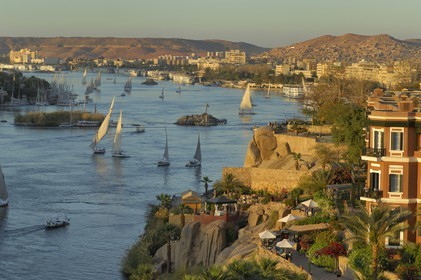 Egypt, Upper Egypt, Nile Valley, Aswan, feluccas on Nile River at Old Cataract Hotel