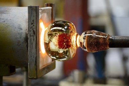 France, Moselle, Saint-Louis-les-Bitche, the Cristallerie Saint-Louis (Saint-Louis crystal glass manufacturer), shaping a hot crystal element, one of the many steps of the realization of a paperweight
