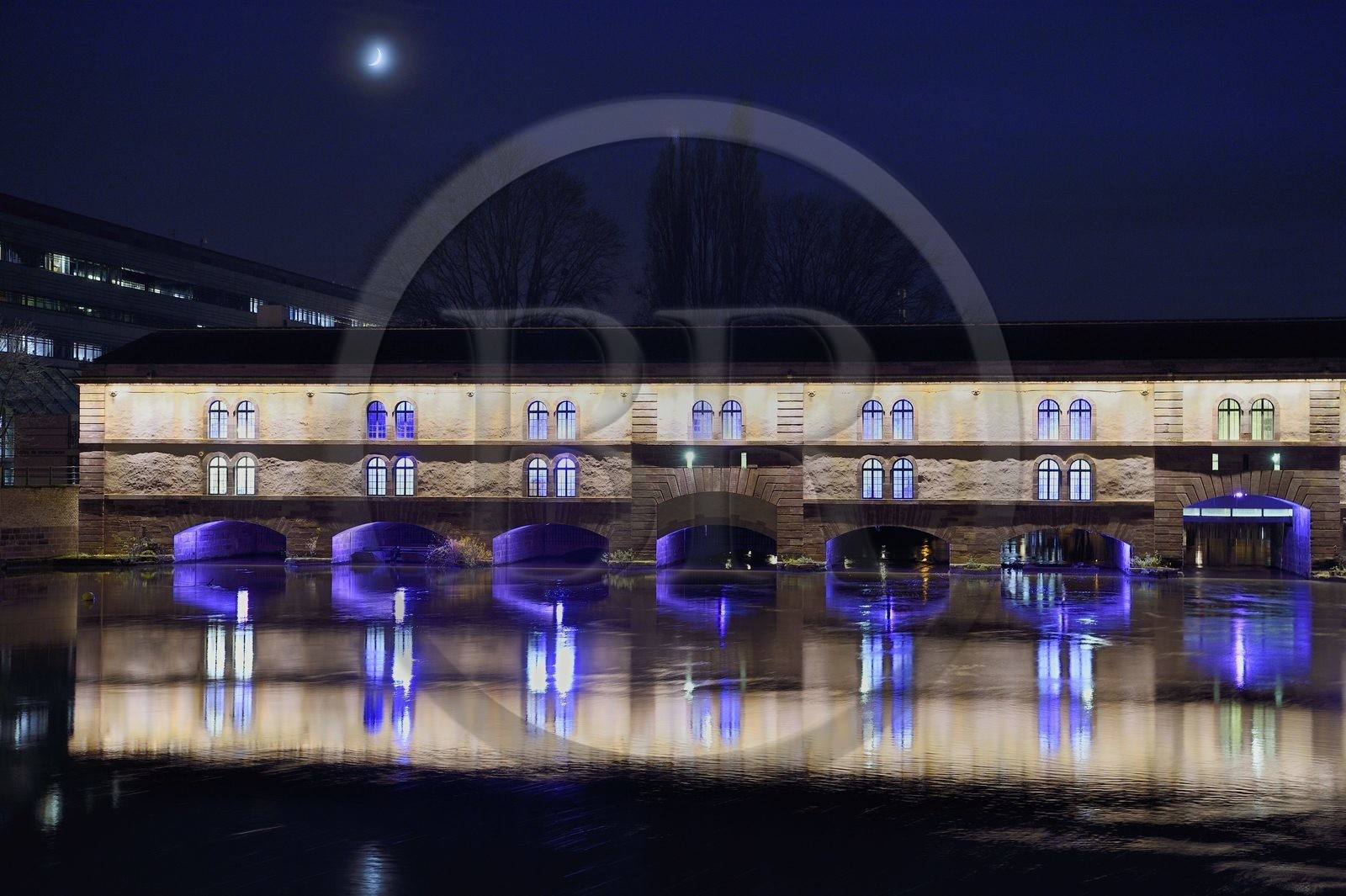 France, Bas Rhin, Strasbourg, old town listed as World Heritage by UNESCO, la Petite France District, Vauban dam and bridge on the Ill river, illuminations in the evening