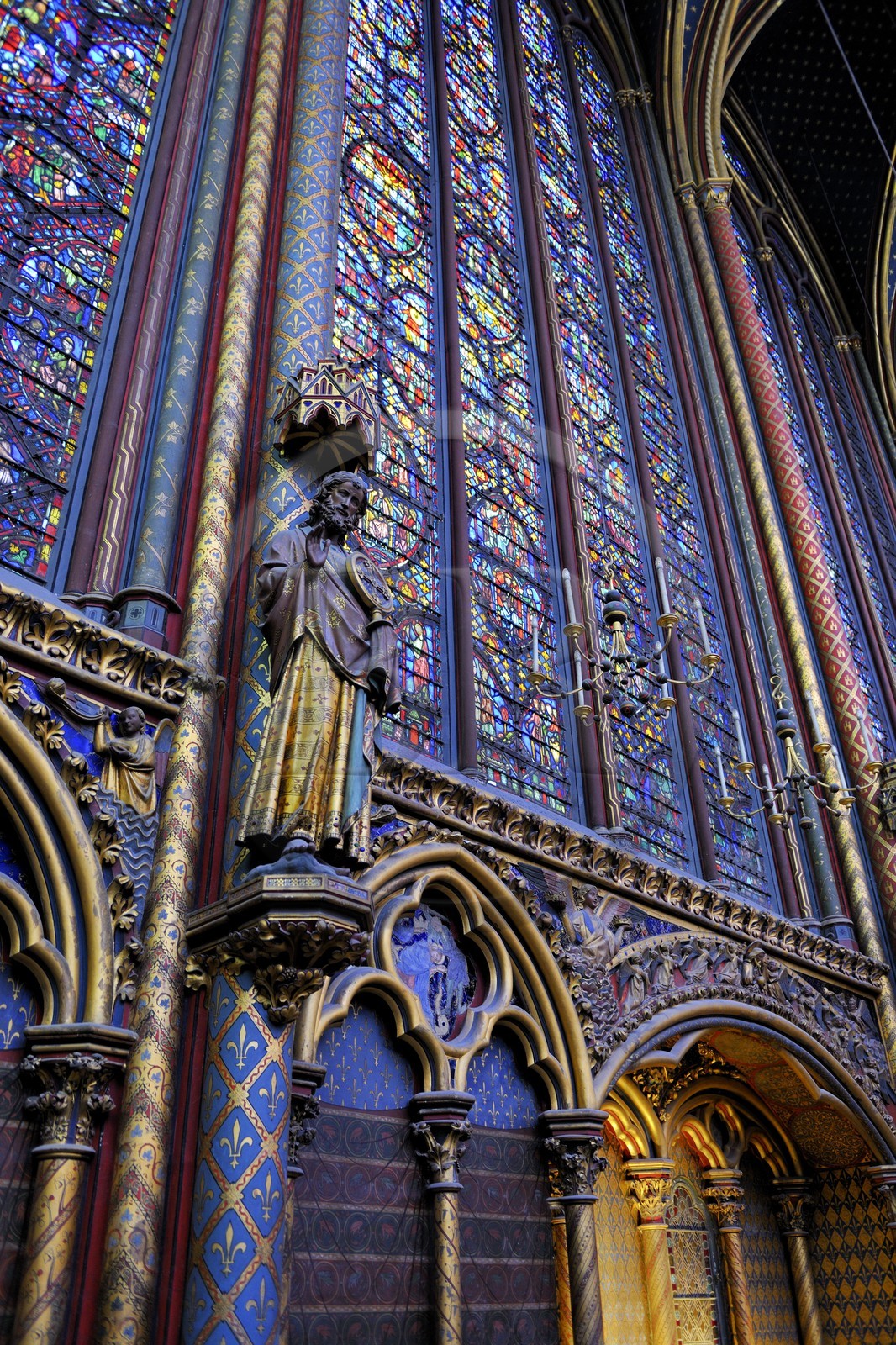 France, Paris, ile de la Cité, the Sainte Chapelle (the Holy Chapel), the Upper Chapel, the stained-glass windows of the Upper Chapel and statue of the apostles