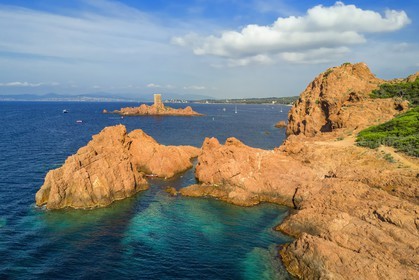 France, Var, Agay area next to Saint-Raphael, Massif de l'Esterel (Esterel Massif), the Corniche d'Or, the ile d'Or island tower next to the Dramont cape (aerial view)