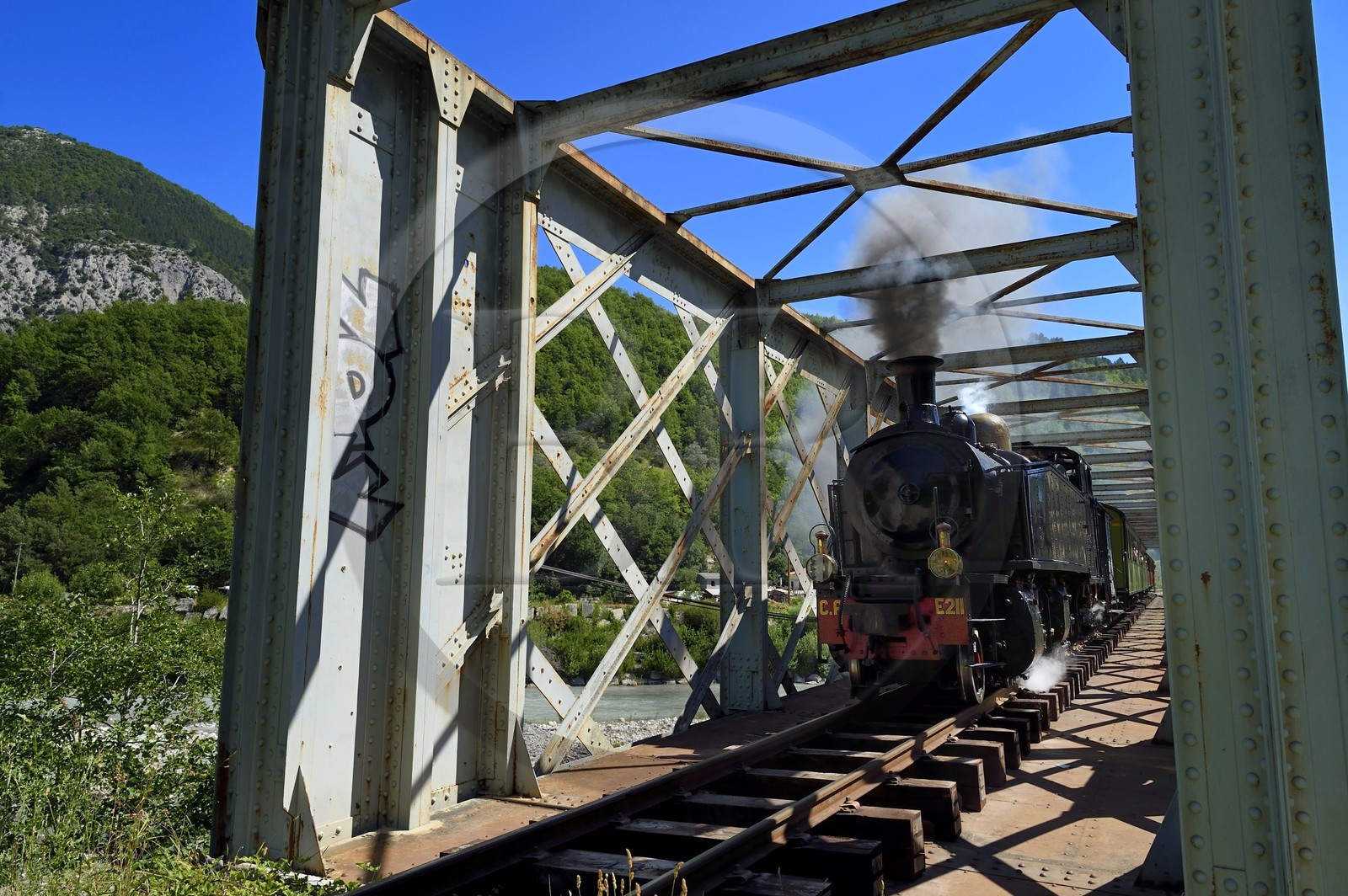 France, Alpes-Maritimes, Puget Theniers, the Train des Pignes, crossing the Pont de la Trinite over the Var river