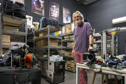 France, Cote d'Or, Beaune, Claude Lelouch Cinema Workshop, this place welcomes since 2016 twelve apprentice directors selected through competitions every year, Rémi Bergman, site director and production manager of Claude Lelouch's films, holding the camera used for the film Itinéraire d'un enfant gaté (1988)