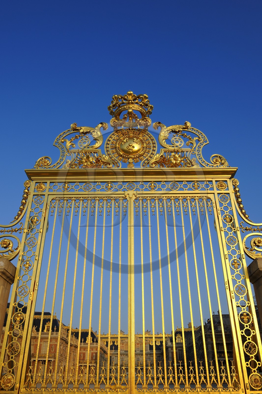 France, Yvelines, Chateau de Versailles, listed as World Heritage by UNESCO, door of the Royal Gate drawn by Mansart (restored in June 2008) which separating the Royal Courtyard