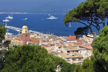 France, Var, Saint-Tropez, Notre Dame de l'Assomption parish church seen from the citadel, Grimaud in the background