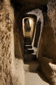 Turkey, Central Anatolia, Nevsehir Province, Cappadocia listed as World Heritage by UNESCO, Kaymakli underground town on eight levels, staircase connecting the levels