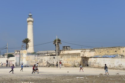 Morocco, Casablanca, children playing football in the popular area of El Hank lighthouse