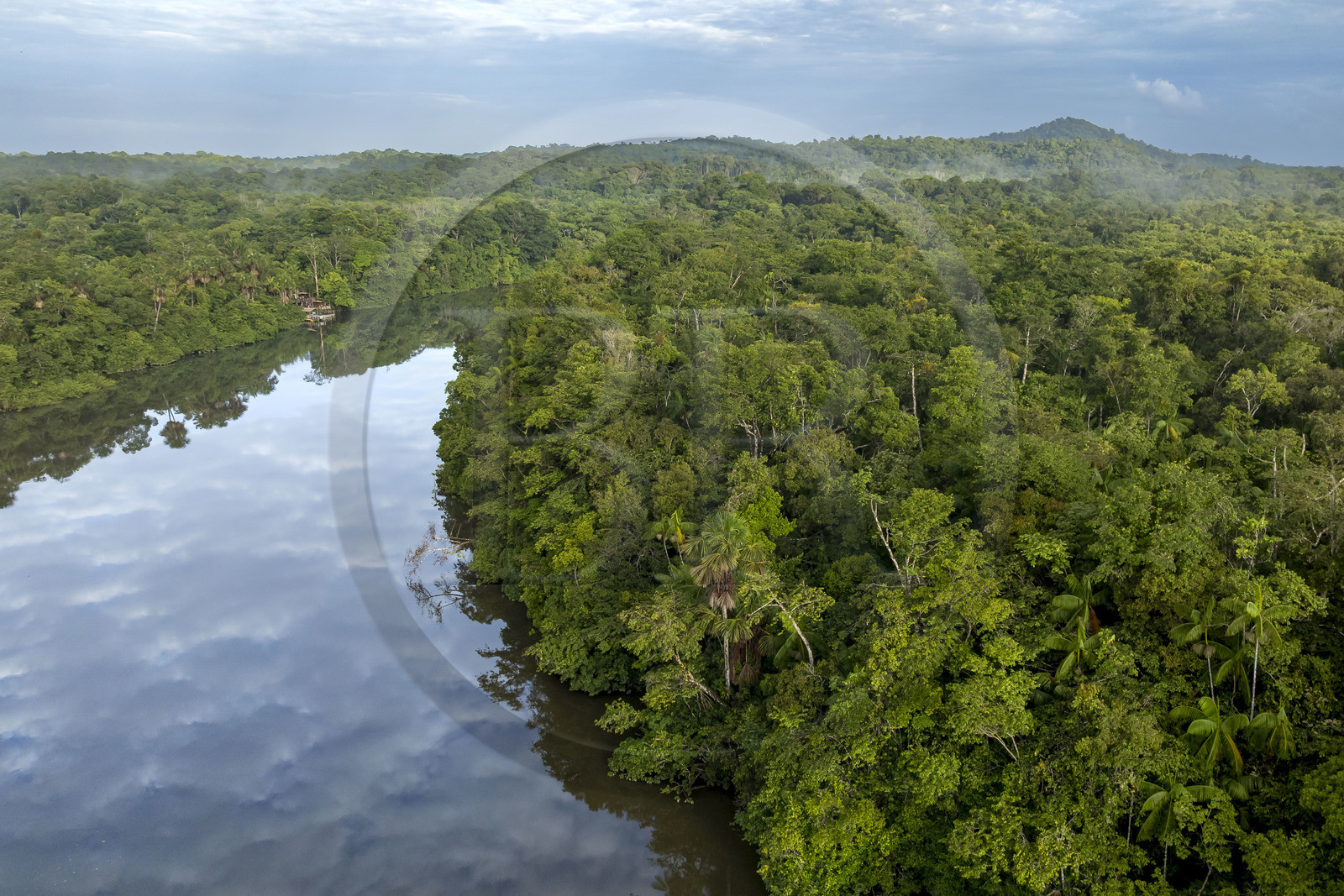 France, French Guiana, Kourou, Camp Maripas, the Kourou River flowing through the rainforest and Monkey Mountain (161 meters altitude) in the background (aerial view)