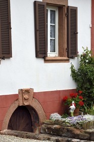 France, Bas Rhin, Northern Vosges Regional Natural Park, Obersteinbach, entrance to the cellar of a traditional stone house