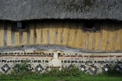 France, Eure, Marais-Vernier, the Big Pond (Grande Mare), traditional timbered and thatched roof house, detail of the facade