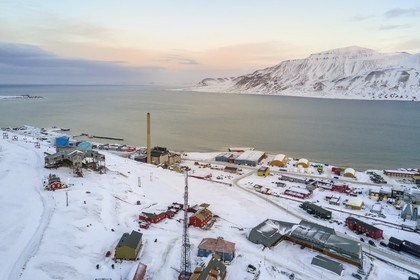 Norway, Svalbard, Spitzbergen, the city of Longyearbyen on the edge of the Adventfjorden (aerial view)