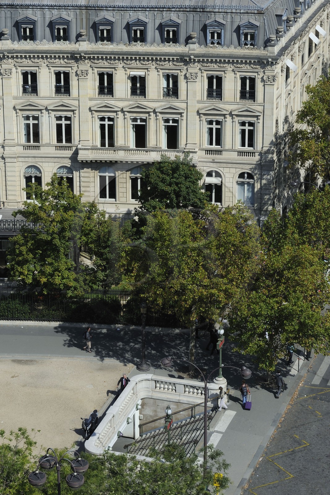 France, Paris, Haussmann type building on the place de l'Etoile at the corner of avenue de Wagram and metro station seen from the top of the Triumphal Arch