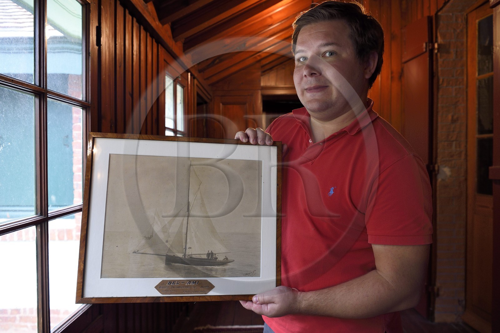France, Seine Maritime, Pays de Caux, Cote d'Albatre, Etretat, the house of Guy de Maupassant called La Guillette, Benoit Reverdy, owner of the villa and vice president of the friends of La Guillette, shows a photo of the Bel-Ami, the boat of Guy de Maupassant
