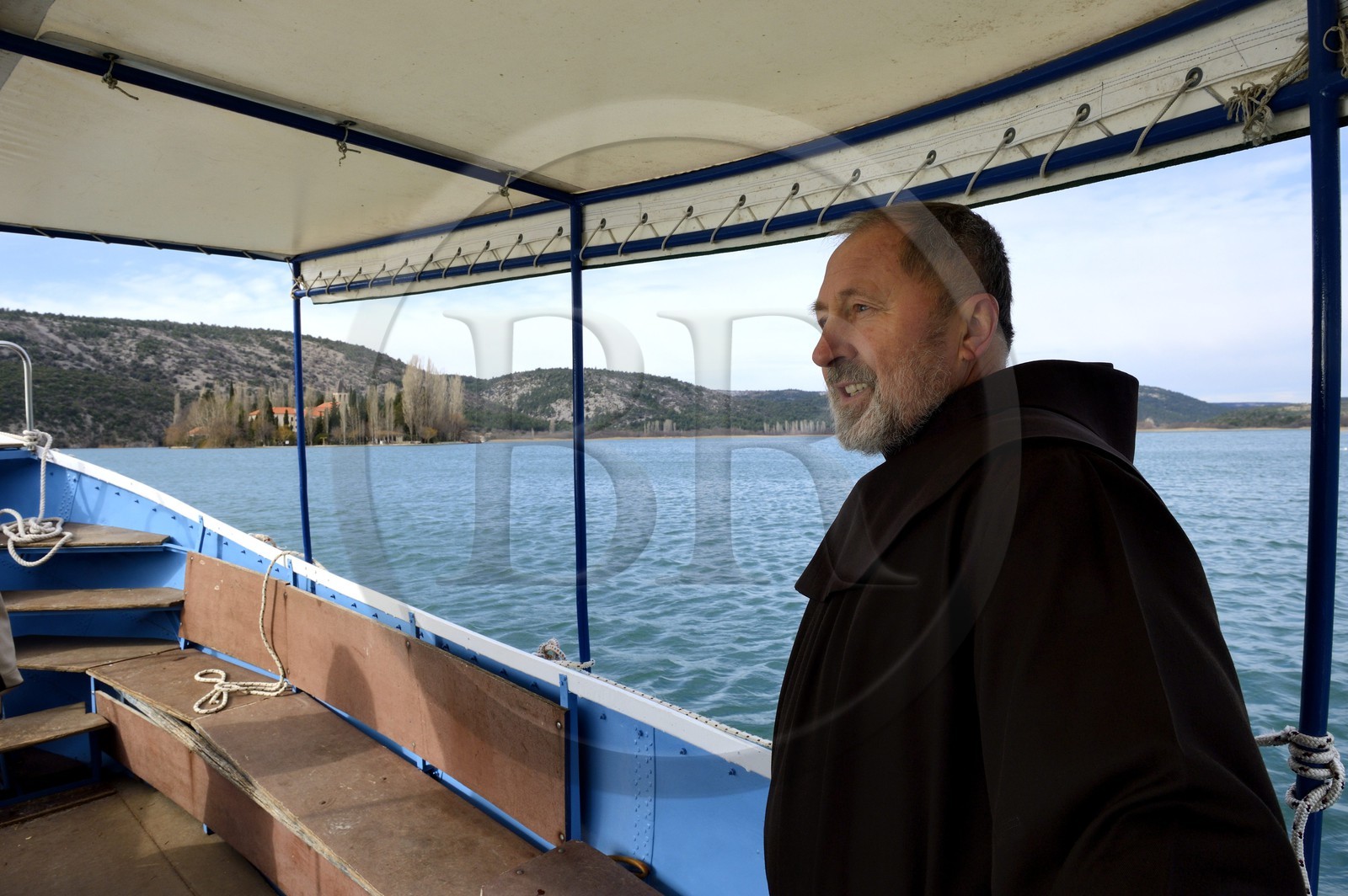 Croatia, Dalmatia, Krka National Park where Krka River becomes Lake Visovac, the Visovac Franciscan Monastery on the island, Brother Stojan