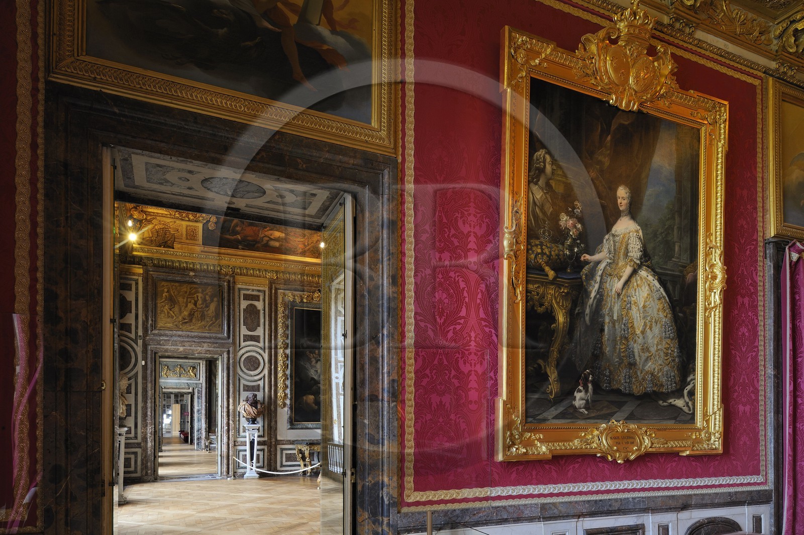 France, Yvelines, Chateau de Versailles, listed as World Heritage by UNESCO, Les Grands Appartements (State Apartments), Mars drawing room with Marie Leszcynska painting by Van Loo and the Diane drawing room in the background