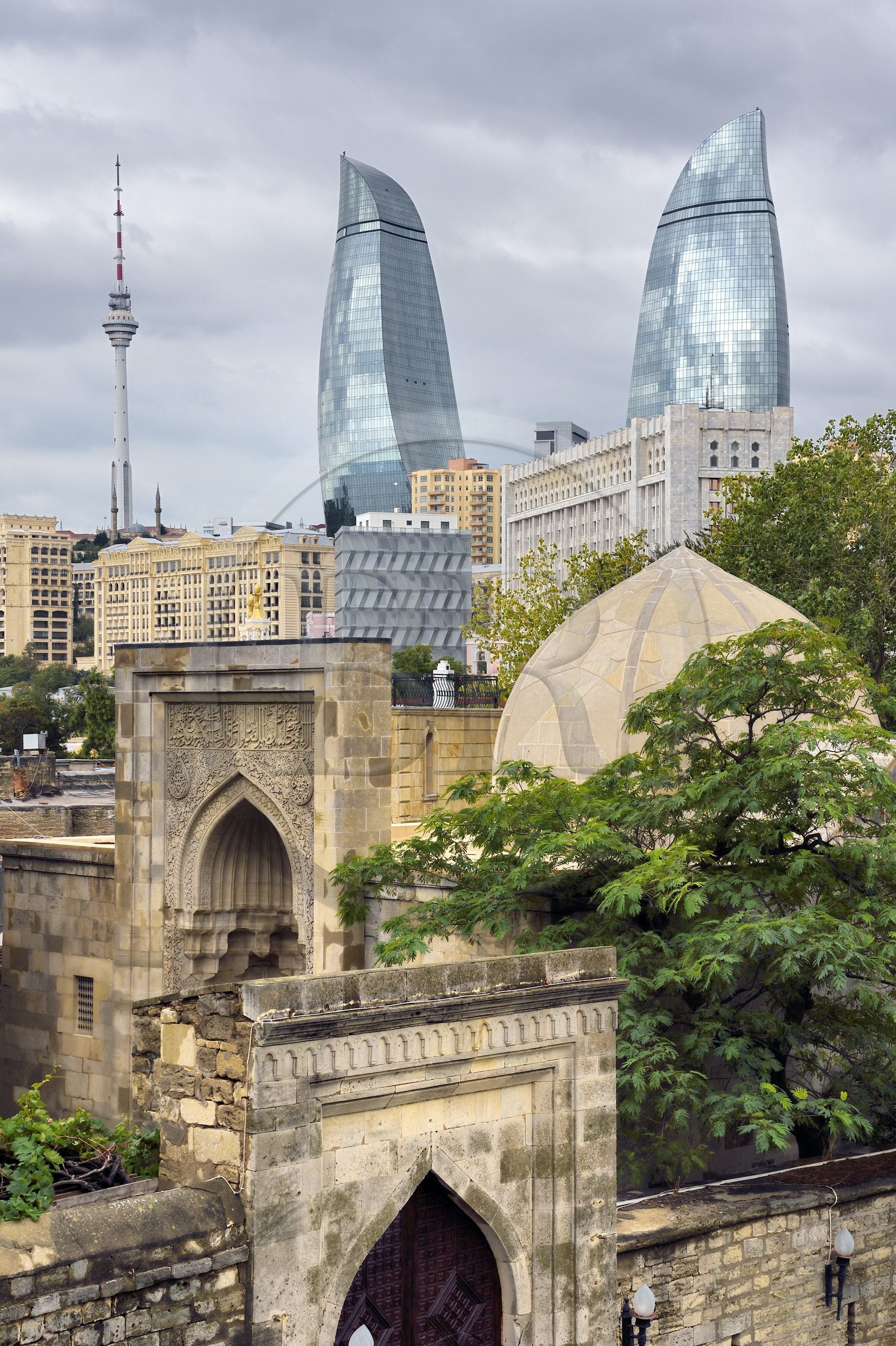 Azerbaijan, Baku, Old City, listed as World heritage by UNESCO, Palace of the Shirvanshahs, the Flame Towers by architects Hellmuth, Obata & Kassabaum in the background