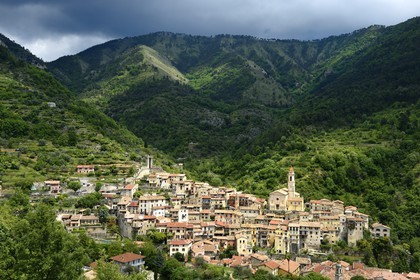 France, Alpes-Maritimes, the hilltop village of Lucéram, the 14th century tower left and St Margaret Church on the right