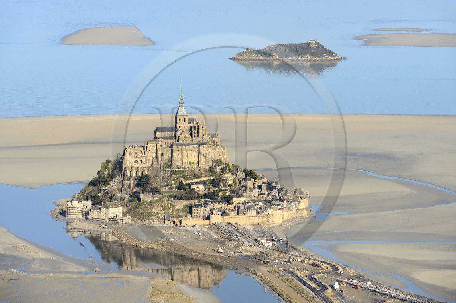 France, Manche, Bay of Mont Saint Michel, listed as World Heritage by UNESCO, Mont Saint Michel and Tombelaine Island at low tide (aerial view)