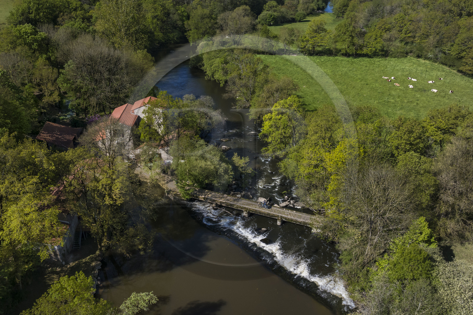 France, Vendee, Chanverrie, cycling on the Vendée Vélo Tour cycle route, crossing the pont du Guy bridge over the Sèvre Nantaise river not far from the Moulin de la Garde (aerial view)