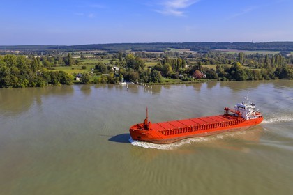 France, Seine-Maritime, Pays de Caux, Norman Seine River Meanders Regional Nature Park, the general cargo ship Merit going up the Seine at Mesnil sous Jumieges (aerial view)