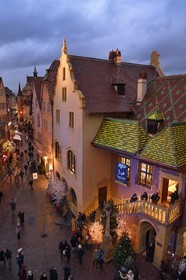 France, Haut Rhin, Colmar, gabled houses and wood-framed houses in Grand Rue with Christmas decorations, on the right the former douane or customs control edifice (Koifhus)