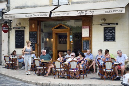 France, Vaucluse, Parc Naturel Regional du Luberon (Natural Regional Park of Luberon), Lourmarin, labelled Les Plus Beaux Villages de France (The Most Beautiful Villages of France), Café terrace in the Main Street