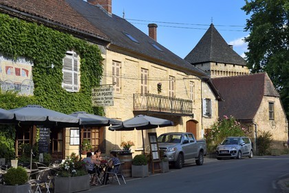 France, Dordogne, Perigord Noir, Vezere Valley, Saint Leon sur Vezere, labelled Les Plus Beaux Villages de France (The Most Beautiful Villages of France), the main street and the keep of the Manoir de la Salle Mansion in the background