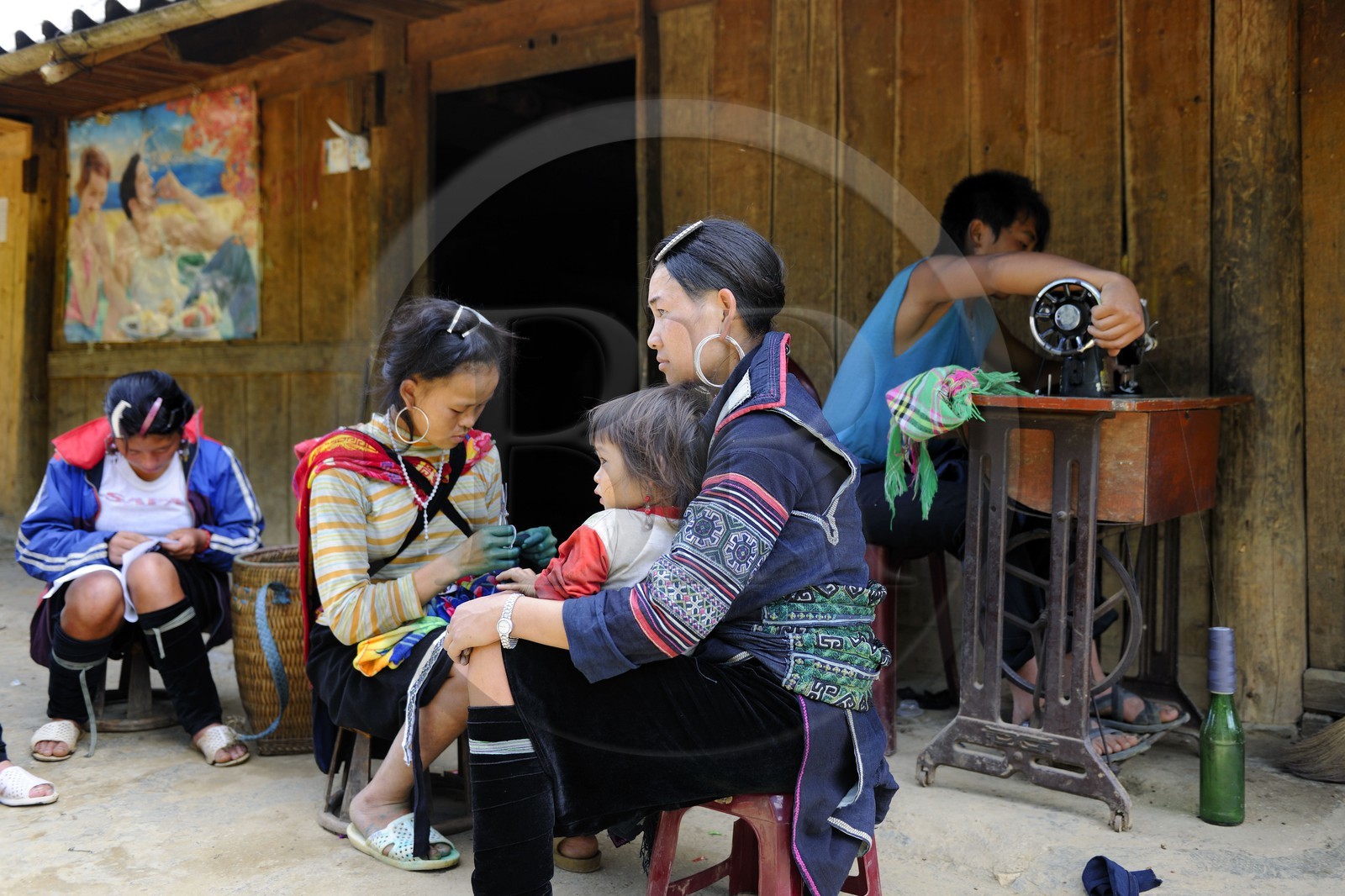 Vietnam, Lao Cai province, Sapa district, the Black Hmong minority group, sewing and blue indigo dyeing work