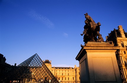 France, Paris, Louvre Museum and Pyramid by the architect Ieoh Ming Pei