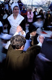 France, Bouches du Rhone, Les Baux de Provence village, labelled Les Plus Beaux Villages de France (The Most Beautiful Villages of France), Christmas celebrations, aubade (dawn serenade) in local Provence costumes