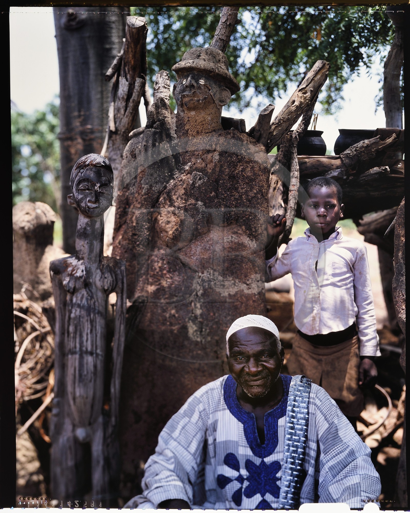 Burkina Faso, Poni province, Lobi land, Gaoua and Loropéni region, peasant and his fetishes in the region of Dagbola, non-traditional fetishes intended to put his family on guard against the colonial and more generally white