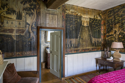 France, Finistère, Roscoff, shipowner's house called la Porte Noire (the Black Gate) built at the end of the 16th century by the James brothers and belonging today to Christian Kulig, master bedroom with murals on wooden partitions  representing Roscoff in the 18th century