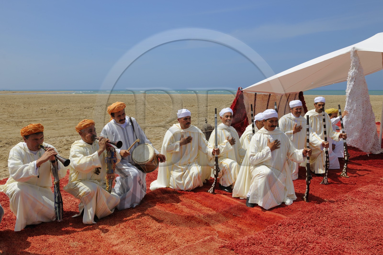 Morocco, Oriental Region, La Reggada traditional dance and music on the beach
