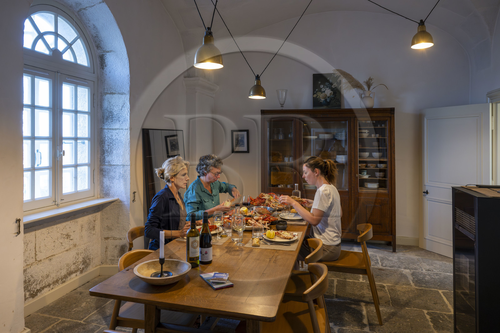France, Finistère, Abers Country (Pays des Abers), Virgin Island, the Virgin Island lighthouse, the old lighthouse from 1845 transformed into an eco-lodge in the former guards' accommodation, seafood platter for dinner in the dining room