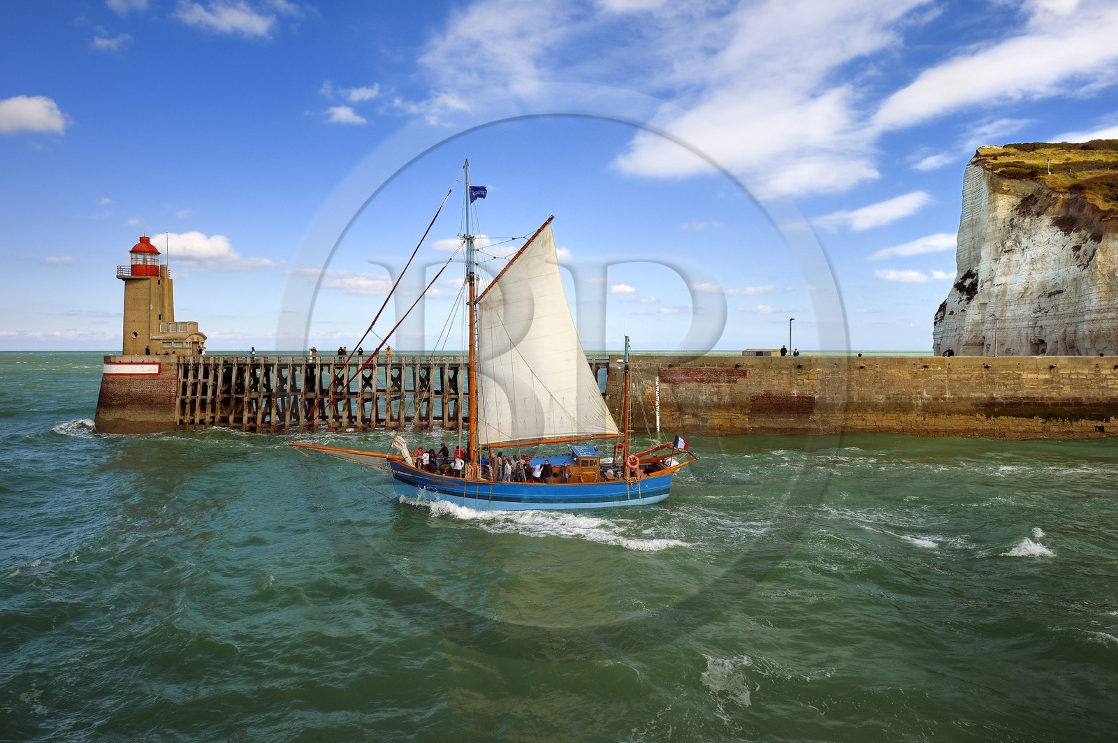 France, Seine Maritime, Pays de Caux, Cote d'Albatre, Fecamp, the old sailing ship Tante Fine leaves the port in front of the Pointe Fagnet lighthouse