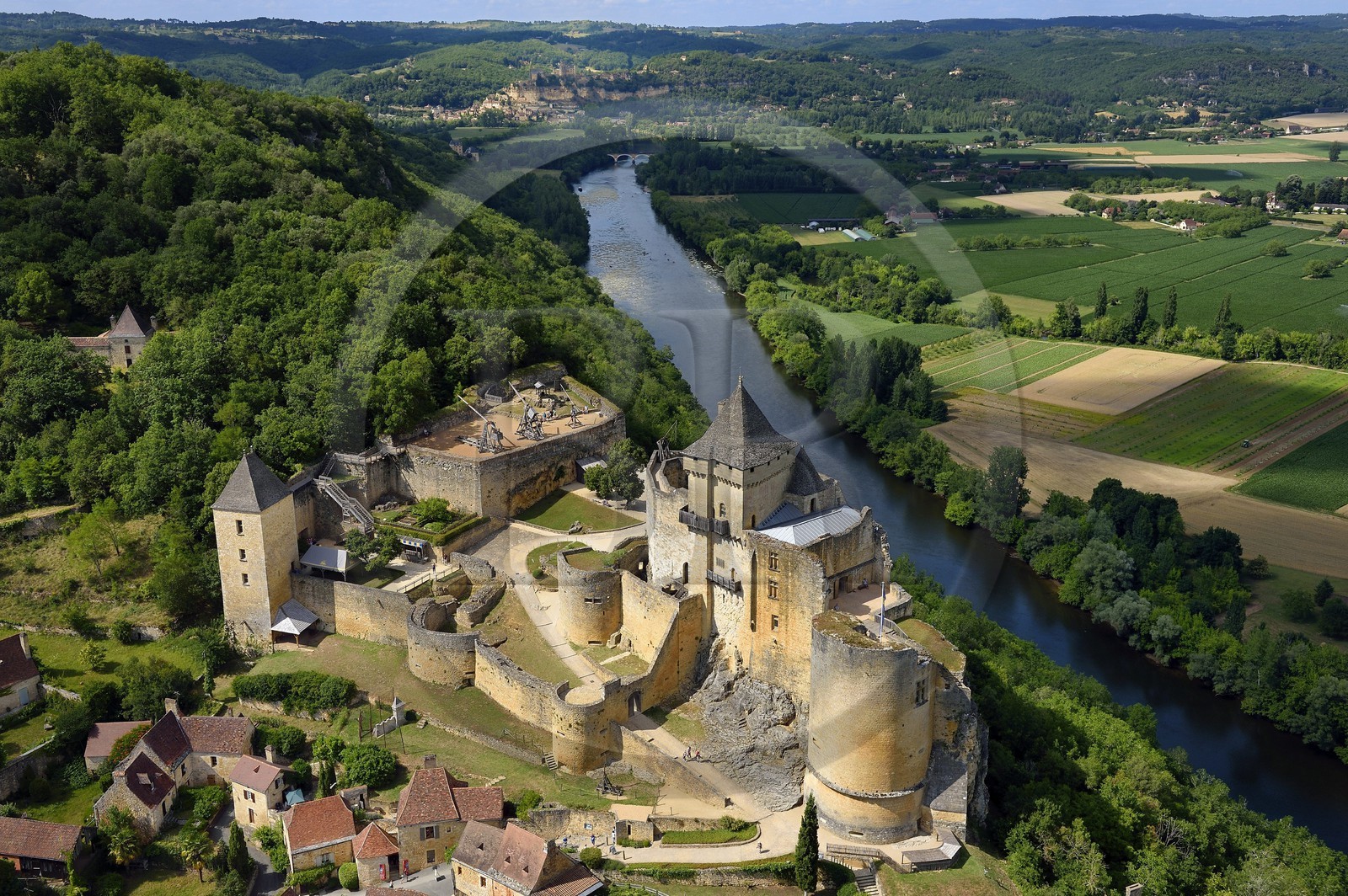 France, Dordogne, Perigord Noir, Dordogne Valley, Castelnaud la Chapelle, labelled Les Plus Beaux Villages de France (The Most Beautiful Villages of France), Castelnaud Castle on a cliff above the Dordogne valley (aerial view)