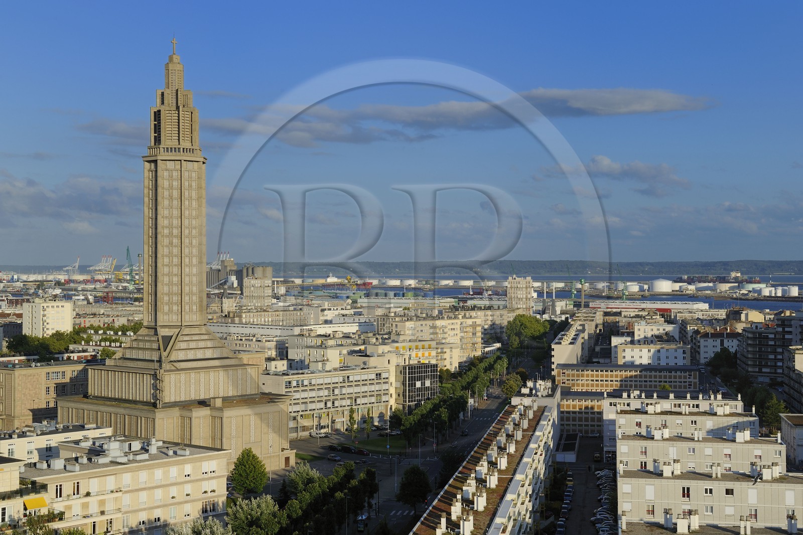 France, Seine Maritime, Le Havre, Downtown rebuilt by Auguste Perret listed as World Heritage by UNESCO, Perret buildings and St. Joseph's Church, the port in the background